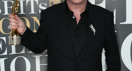Elton John with his BRITs Icon Award