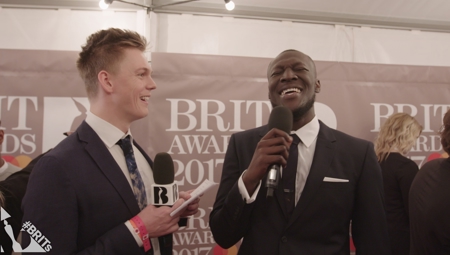 Caspar Lee and Stormzy on The BRITs Red Carpet