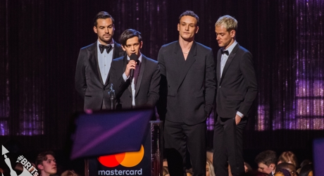 The 1975 accepting their BRIT Award