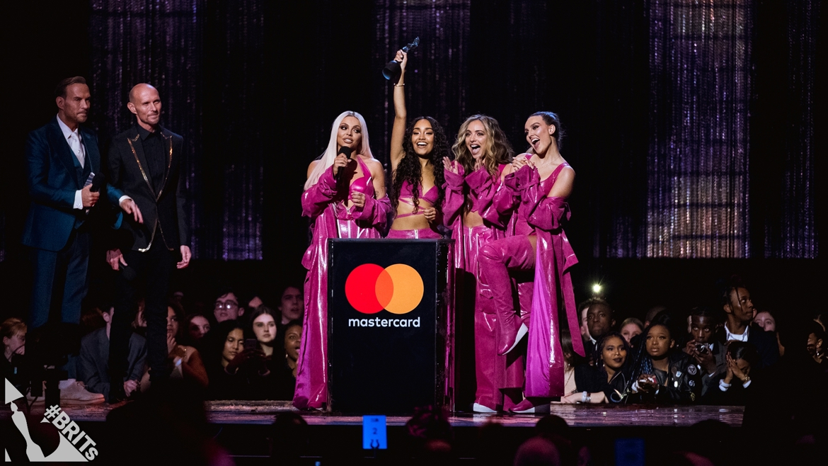 Little Mix accepting their BRIT Award