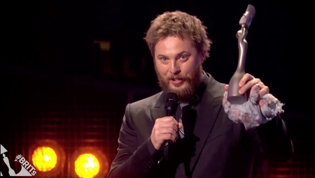 Duncan Jones collects Bowie's Mastercard British Album trophy