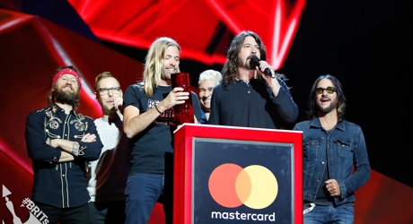 Foo Fighters accepting their award for International Group at The BRIT<span class='lowercase'>s</span>