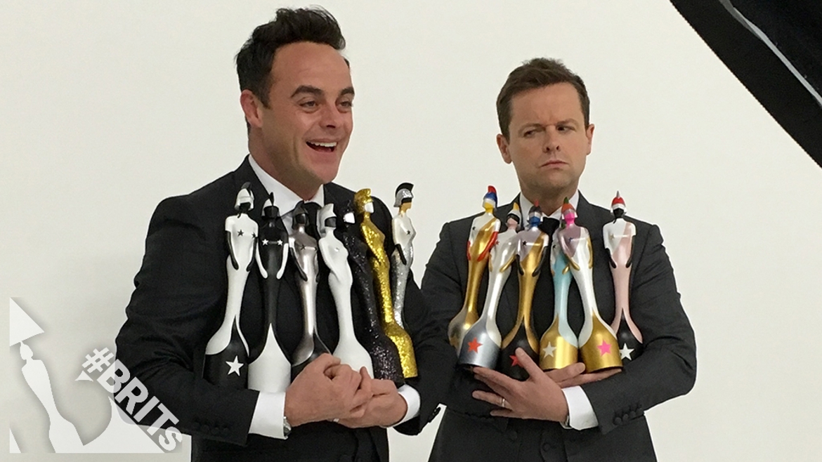 How many trophies are Ant and Dec holding?