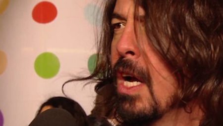 Dave Grohl chats on the 2013 BRIT Awards red carpet