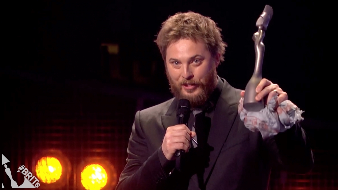 Duncan Jones collects Bowie's Mastercard British Album trophy