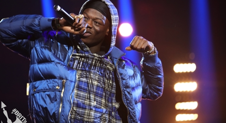 J Hus on stage at The BRIT<span class='lowercase'>s</span> 2018 Nominations Show (1)